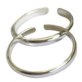 A pair of 2mm Sterling Adjustable Toe Rings