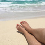 1mm Simple Toe Ring shown on a foot at a beach (c) ToeRings.com LLC 2022