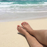 1mm Simple Toe Ring shown on a foot at a beach (c) ToeRings.com LLC 2022