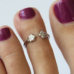 CZ Flower Sterling Adjustable Toe Ring on a pedicured foot