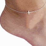 Sideways Cross Sterling Anklet shown on a model