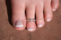 Fitted toe rings on the beach