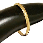 A 1mm Gold Fill Thumb Ring shown here on a model