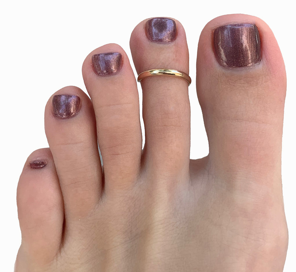 Shown here on a foot, 1mm Simple Band Adjustable Toe Ring for Men and Women One Size Fits All (c) 2022