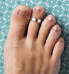 5mm Hammered Sterling Adjustable Toe Ring shown on a foot