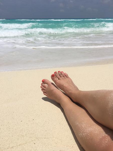 1mm Simple Toe Ring shown on a foot at a beach (c) ToeRings.com LLC 2022