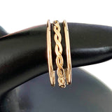 Skinny Band and Braid Stack Toe Rings shown in gold fill on a model's finger