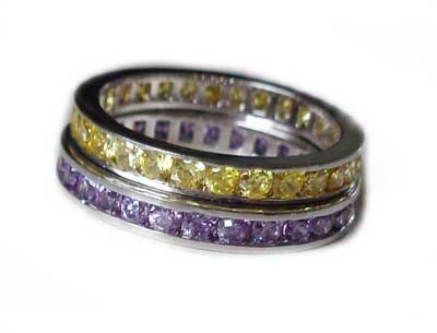 CZ Rainbow Eternity Stack Toe Rings shown in purple and yellow