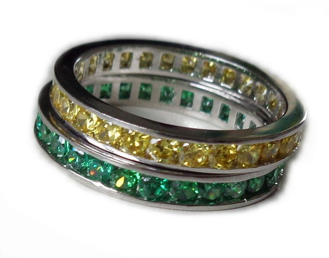 CZ Rainbow Eternity Stack Toe Rings shown in green and yellow