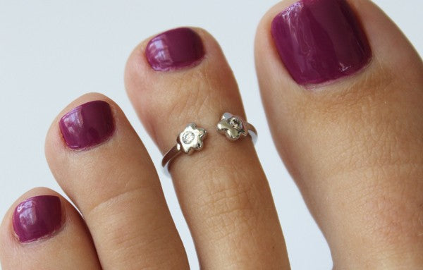 CZ Flower Sterling Adjustable Toe Ring on a pedicured foot