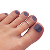 Summer Breeze Toe Ring shown in gold fill on a model's toe