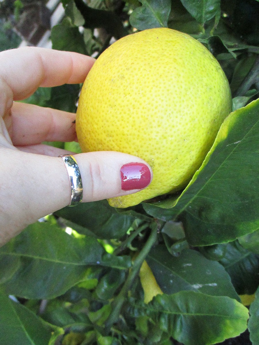 5mm Bold Sterling Thumb Ring shown on a hand