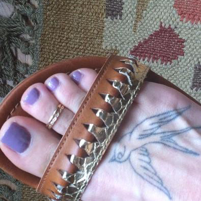 Braid Skinny Toe Ring and 1mm toe ring shown in 14k gold fill on a foot