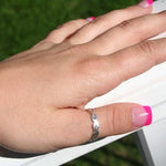 Braid Brawny Sterling Thumb Ring shown on a woman's hand